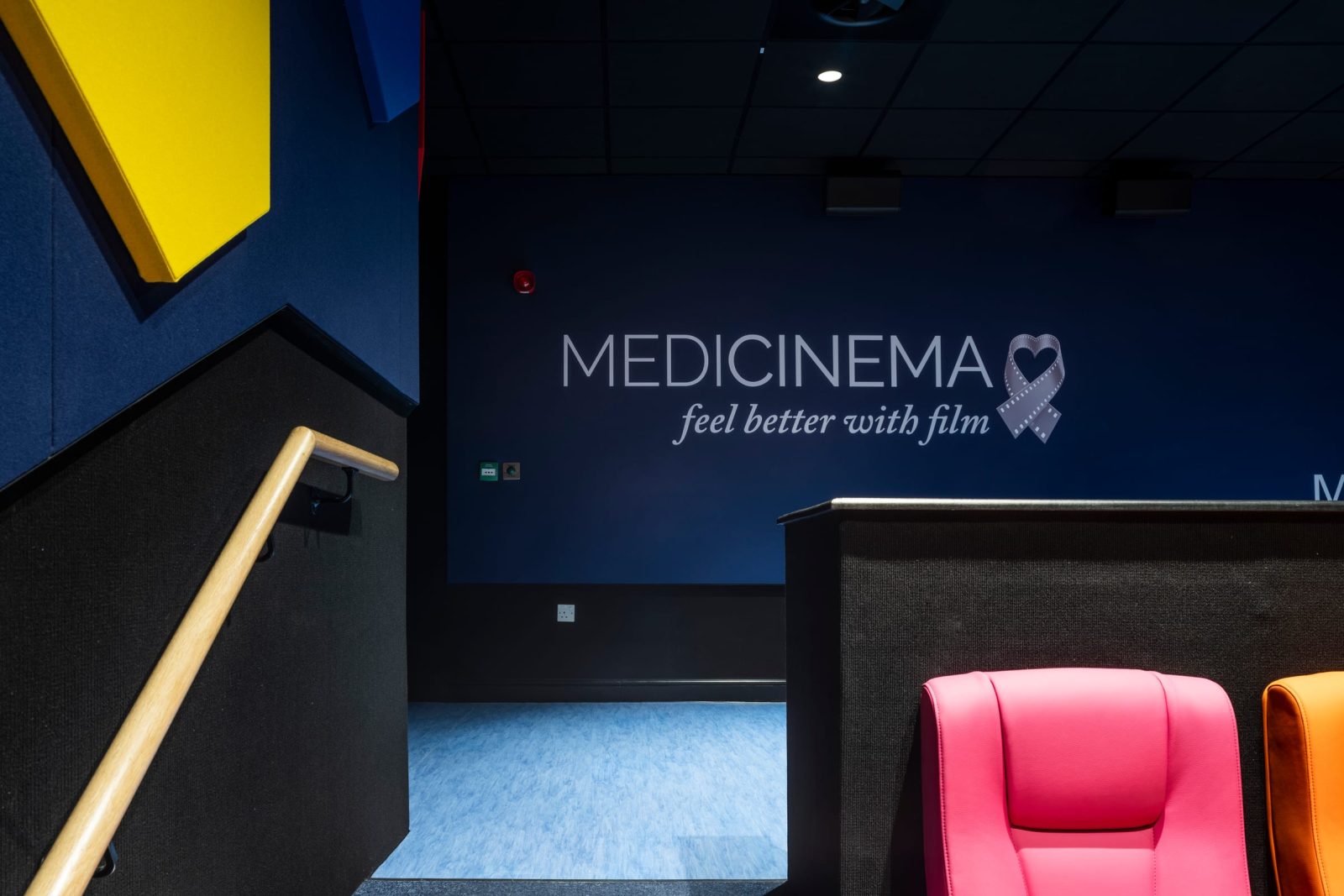 MediCinema branding on the auditorium wall